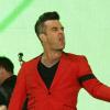 Robbie Williams lors du Summertime Ball organisé par Capital FM au stade de Wembley à Londres le 9 juin 2013.