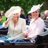 Kate Middleton, duchesse de Cambridge, enceinte de 8 mois et en Alexander McQueen, et Camilla Parker Bowles, duchesse de Cornouailles, le 15 juin 2013, lors de la procession de la famille royale à l'occasion de la parade Trooping the Colour, à la gloire des forces armées et de l'anniversaire de la souveraine, Elizabeth II.