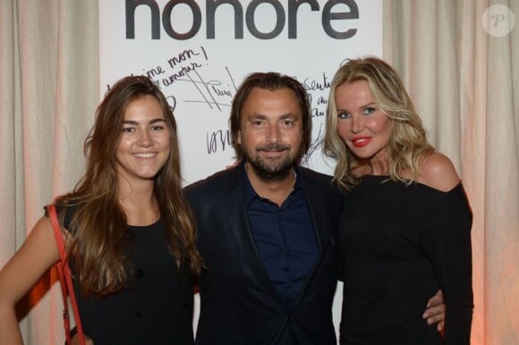 Henri Leconte avec sa fille Sara Luna et sa femme Florentine lors de son 50e anniversaire célébré au restaurant Très Honoré à Paris le 30 mai 2013