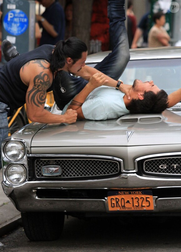Taylor Lautner battu par un latino-américain sur le tournage du film Tracers à New York, le 24 Juin 2013.