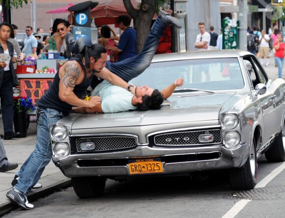 Taylor Lautner sur le tournage du film Tracers à Chinatown, New York, le 24 Juin 2013.