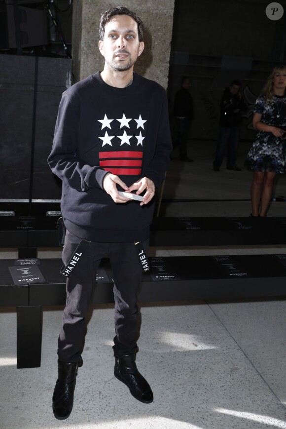 Le magicien Dynamo assiste au défilé Givenchy printemps-été 2014 à la Cité de la Mode et du Design. Paris, le 28 juin 2013.