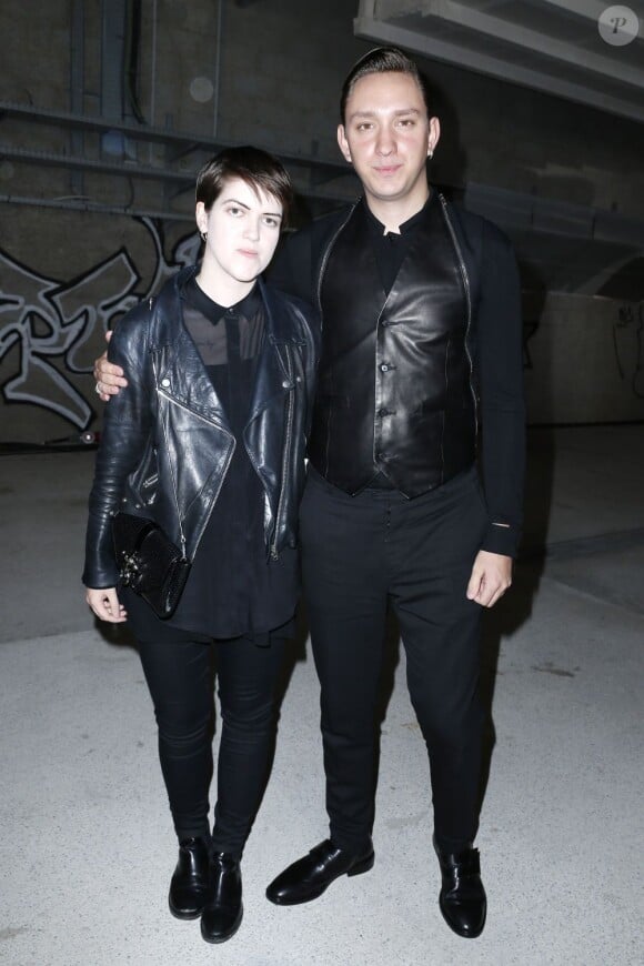 Romy Madley Croft et Oliver Sim du groupe XX assistent au défilé Givenchy printemps-été 2014 à la Cité de la Mode et du Design. Paris, le 28 juin 2013.