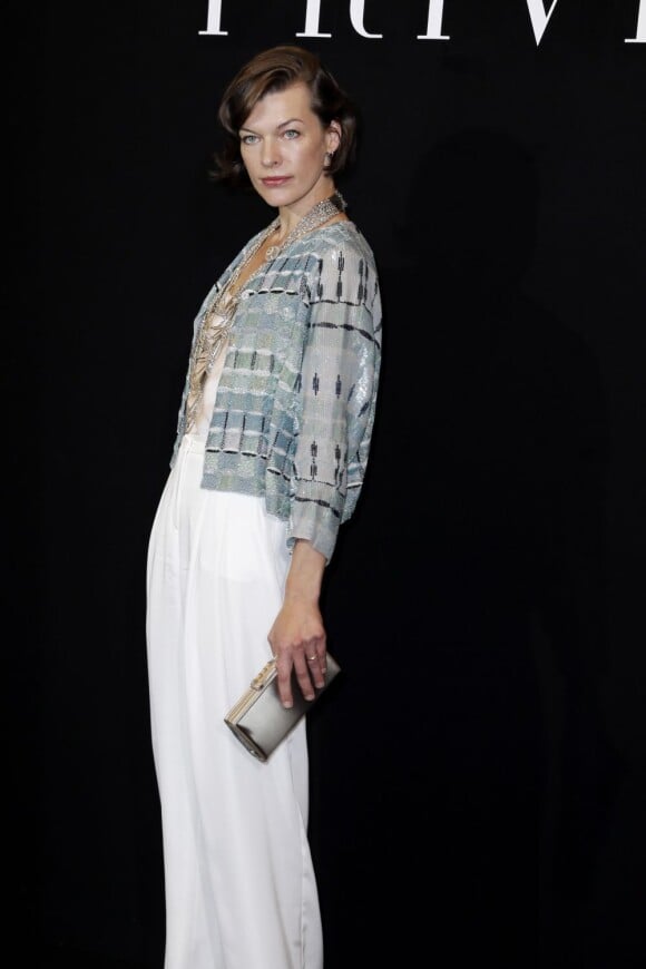 Milla Jovovich - Photocall du défilé de mode Haute Couture automne-hiver 2013-2014 Giorgio Armani Privé. A Paris le 2 juillet 2013.