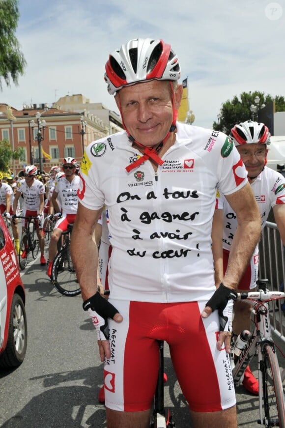 Patrick Poivre d'Arvor participe à l'étape du Coeur au profit de Mécénat Chirurgie Cardiaque en marge de la quatrième étape du Tour de France, à Nice le 2 juillet 2013.