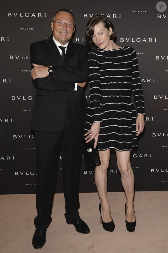 Milla Jovovich le président de Bulgari, Jean-Christophe Babin - soirée Bulgari pour la collection Diva à l'Hôtel Potocki à Paris, le 2 juillet 2013.