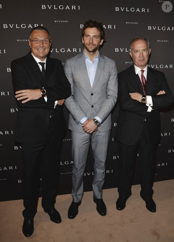 Bradley Cooper entouré de Jean-Christophe Babin et Francesco Trapani de Bulgari - soirée Bulgari pour la collection Diva à l'Hôtel Potocki à Paris, le 2 juillet 2013.