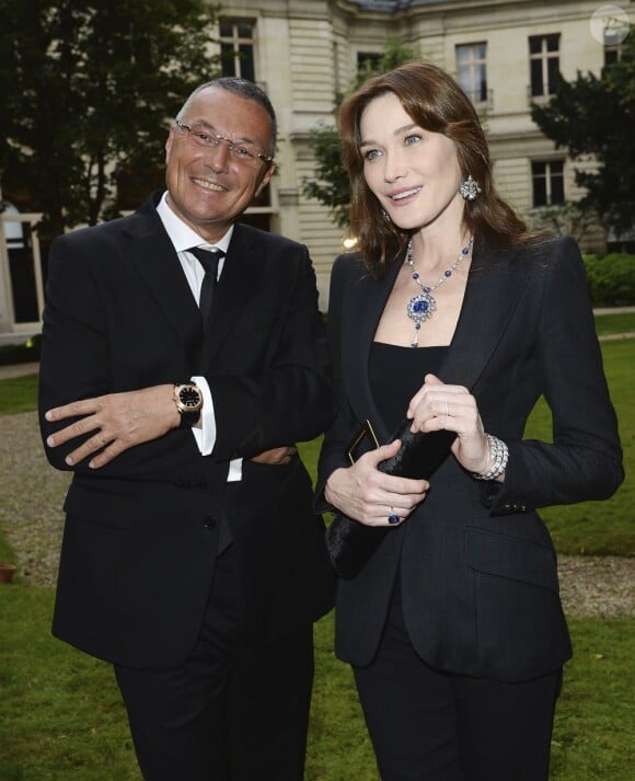 Carla Bruni et le président de Bulgari, Jean-Christophe Babin - soirée Bulgari pour la collection Diva à l'Hôtel Potocki à Paris, le 2 juillet 2013.