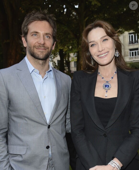 Bradley Cooper et Carla Bruni - soirée Bulgari pour la collection Diva à l'Hôtel Potocki à Paris, le 2 juillet 2013.