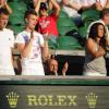 Marion Bartoli en compagnie du frère de Kristina Mladenovic lors de la victoire de cette dernière en finale du double mixte de Wimbledon le 7 juillet 2013