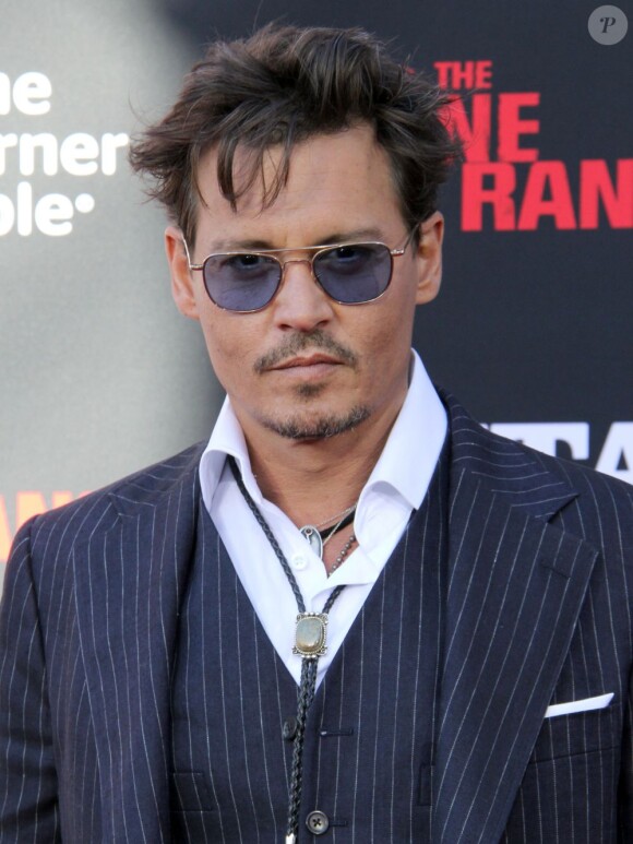 Johnny Depp à la première mondiale du film  Lone Ranger à Anaheim le 22 juin 2013.