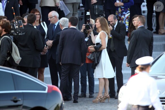 Anne Gravoin et Manuel Valls au défilé du 14 juillet 2013 à Paris.