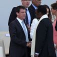 Manuel Valls et Dioncounda Traore, le president par intérime du Mali au défilé du 14 juillet 2013 à Paris.