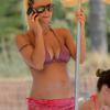 Michelle Hunziker, enceinte de Tomaso Trussardi, se baigne lors de ses vacances à Ibiza, le 18 juillet 2013.