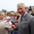  Quelques bébés étaient évidemment au rendez-vous... Le prince Charles et Camilla Parker Bowles étaient en visite à Bugthorpe, dans l'East Yorkshire, le 23 juillet 2013, au lendemain de la naissance du prince de Cambridge, premier enfant du prince William et de Kate Middleton. 