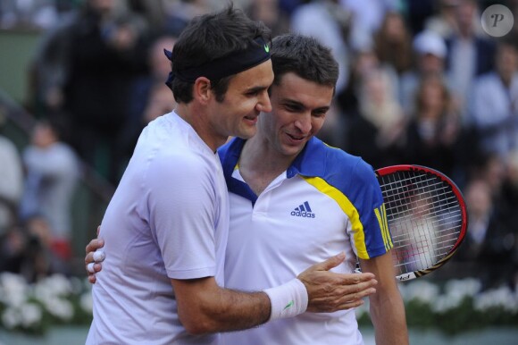 Roger Federer et Gilles Simon à Roland-Garros le 2 juin 2013