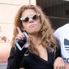 La comédienne AnnaLynne McCord, totalement déboussolée et étourdie à la sortie du dentiste, est accompagnée par son compagnon Dominic Purcell, à Beverly Hills, le 26 juillet 2013