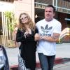 AnnaLynne McCord, totalement déboussolée et étourdie à la sortie du dentiste, est accompagnée par son compagnon très musclé Dominic Purcell, à Beverly Hills, le 26 juillet 2013