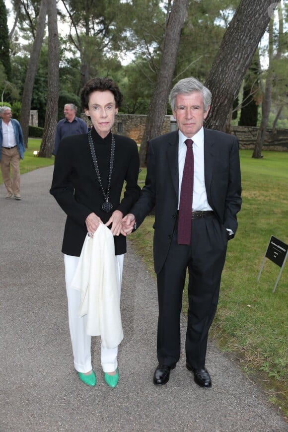 Alain Minc et son epouse à Saint-Paul-de-Vence le 28 juin 2013.