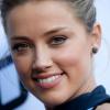 Amber Heard sublime et incendiaire à la première de Paranoia au DGA Theater à Los Angeles, le 8 août 2013.