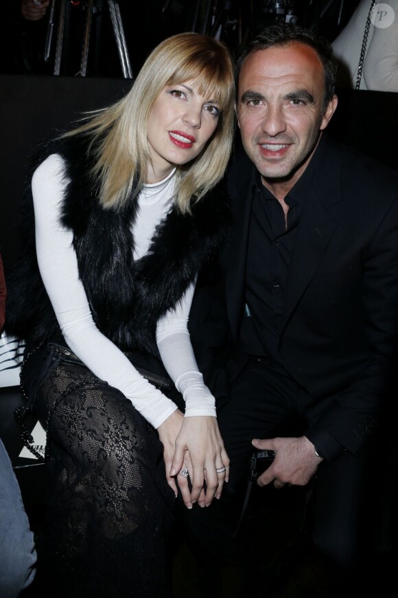 Nikos Aliagas et Tina Grigoriou au défilé Jean Paul Gaultier à Paris, le 2 mars 2013.