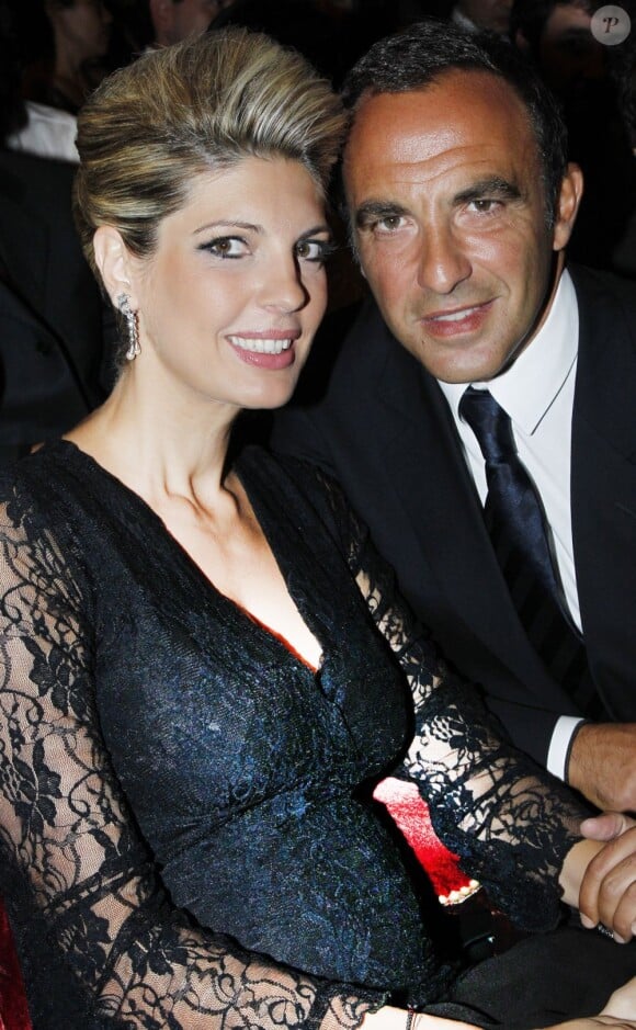 Exclusif - Nikos Aliagas et sa compagne Tina Grigoriou au concert de George Michael, le 9 septembre 2012.