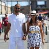 Tony Parker et sa fiancée Axelle Francine se promènent main dans la main à Saint-Tropez, le 20 août 2013.