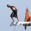 Tony Parker, en vacances à Saint-Tropez, pique une tête en mer. Le 18 aout 2013.