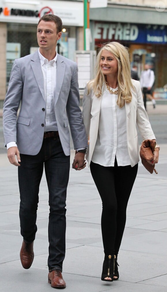 Johnny Evans et sa femme lors d'un repas entre les joueurs de Manchester United le 20 août 2013 à Manchester.