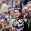 La princesse Mary de Danemark en supportrice de son mari Frederik lors de l'Ironman de Coepnhague le 18 août 2013