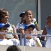 Michelle Obama et ses filles, Sasha et Malia, dans les tribunes pour le Arthur Ashe Kids' Day à New York, le 24 août 2013.