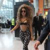 Lady Gaga arrive à l'aéroport d'Heathrow à Londres. Le 27 août 2013.