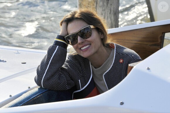 Virginie Ledoyen arrive en bateau pour assister au 70e festival du film de Venise, le 27 août 2013.