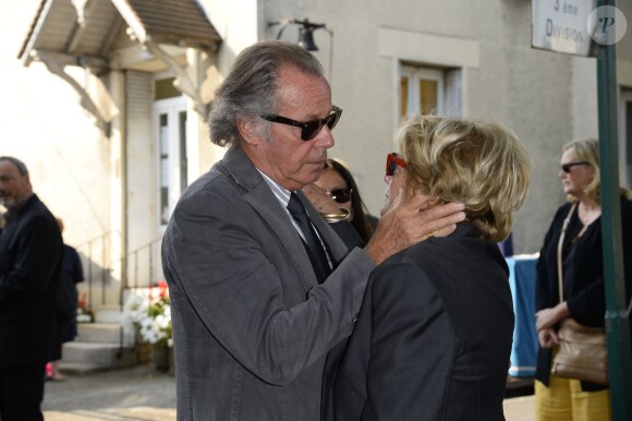 Michel Leeb et Francoise Huth, femme de Pierre Huth aux obsèques de Pierre Huth à Nogent-sur-Marne le 30 août 2013.