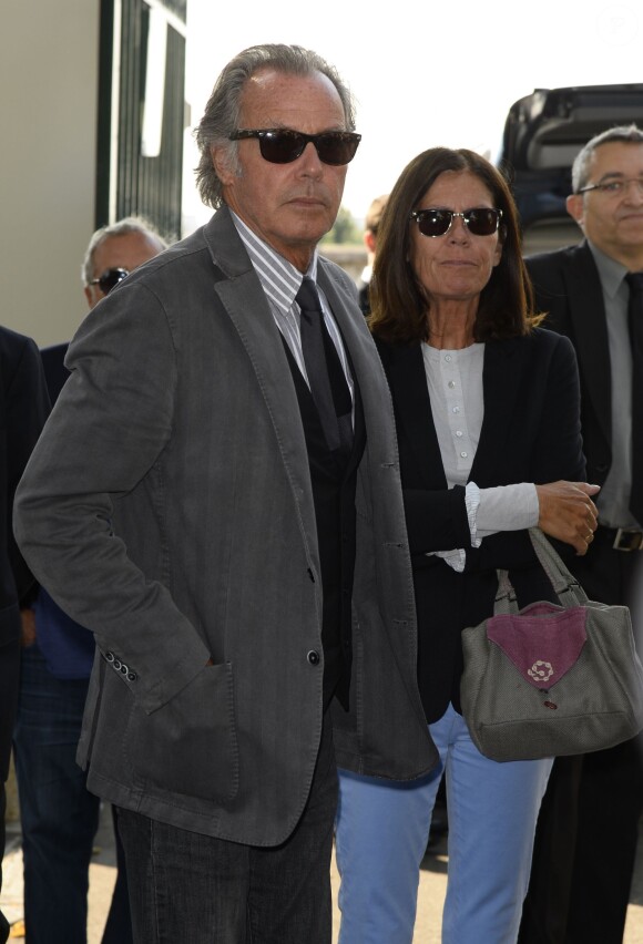 Michel Leeb et sa femme aux obsèques de Pierre Huth à Nogent-sur-Marne le 30 août 2013.