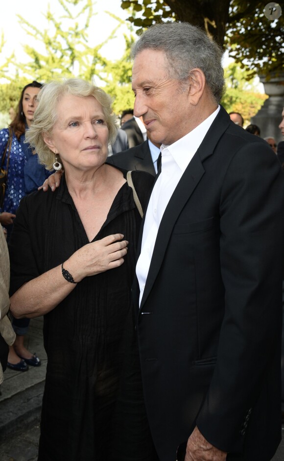 Marie-Christine Barrault et Michel Drucker aux obsèques de Pierre Huth à Nogent-sur-Marne le 30 août 2013.