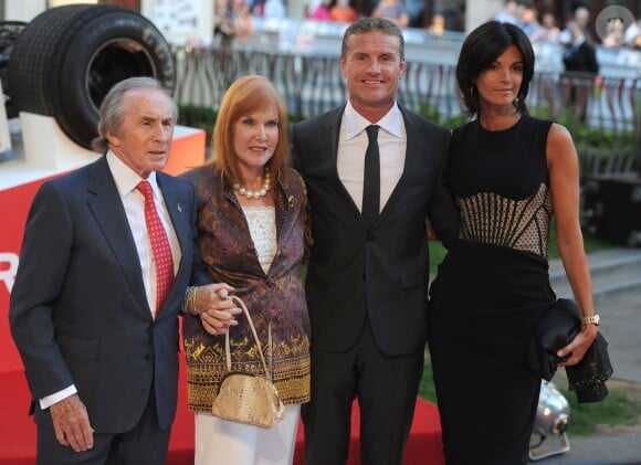 Sir Jackie Stewart, sa femme Helen, David Coulthard et Karen Minier lors de l'avant-première de Rush à Londres le 2 septembre 2013.