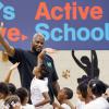 Michelle Obama s'est rendue dans une école primaire de Washington avec Shaquille O'Neal pour faire du sport et délivrer un discours, le 6 septembre 2013.