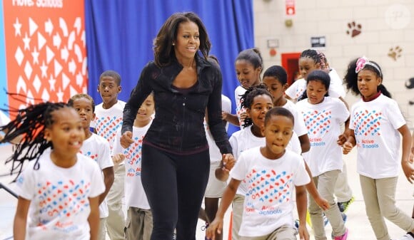 Michelle Obama s'est rendue dans une école primaire de Washington avec Shaquille O'Neal pour faire un peu de sport et délivrer un discours, le 6 septembre 2013.
