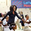 Michelle Obama s'est rendue dans une école primaire de Washington avec Shaquille O'Neal pour faire du sport et délivrer un discours, le 6 septembre 2013.

