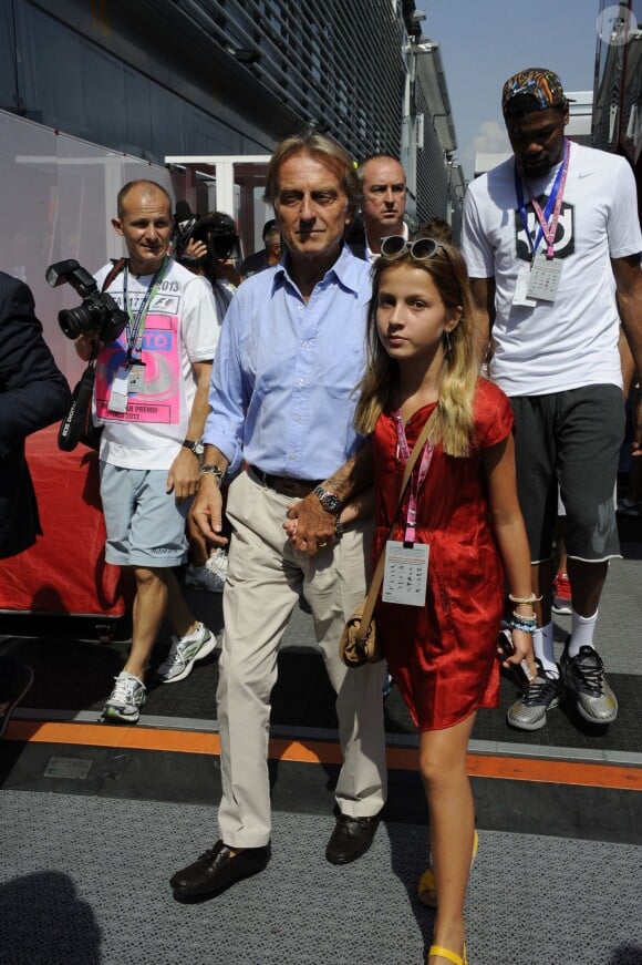Luca Cordero di Montezemolo et sa fille dans les travées du Grand Prix d'Italie à Monza, le 8 septembre 2013