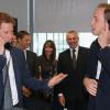Le prince William et son frère le Prince Harry tente de conclure le plus gros deal lors de la journée de charité organisée chaque 11 septembre en mémoire des attentats du World Trade Centre par la société BGC Partners à Londres le 11 septembre 2013