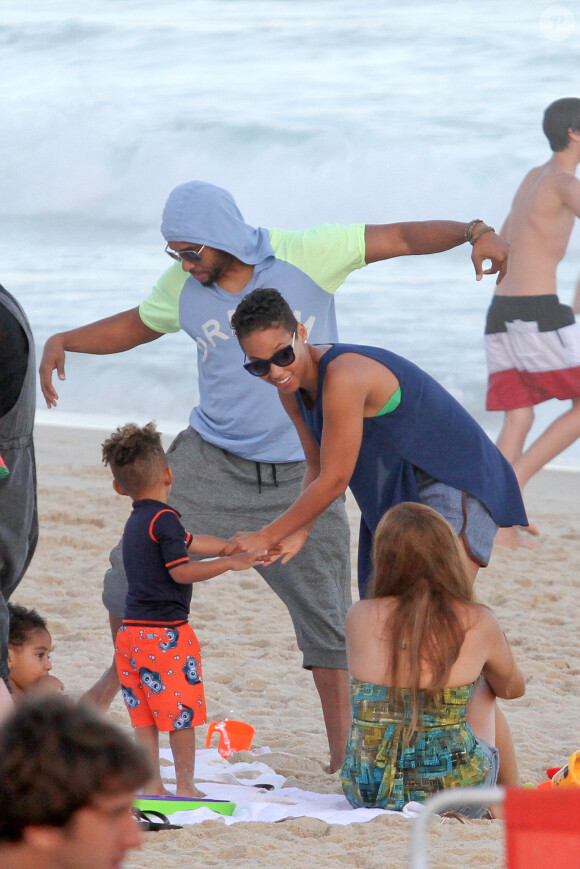 Please hide the child's face prior to the publication. Exclusive - R&B artist Alicia Keys and her husband Swizz Beatz, her mom Terria Joseph and little Egypt enjoyed the nice and warm weather, making sand castles and taking pictures in Rio de Janeiro, Brazil on September 9, 2013. The singer/songwriter is in town to perform at Rock in Rio Festival next Friday, September 13. Photo by GSI/ABACAPRESS.COM09/09/2013 - Rio de Janeiro
