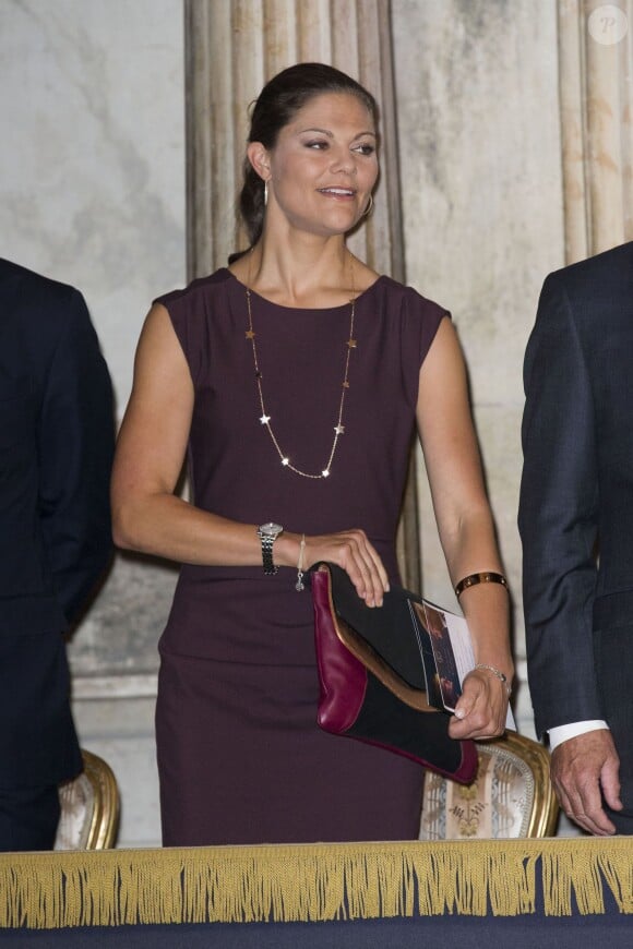 La princesse Victoria de Suède lors de l'inauguration de l'exposition "40 ans sur le trône, 40 ans au service de la Suède" dans le cadre du jubilé des 40 ans de règne du roi Carl XVI Gustaf à Stockholm, le 13 septembre 2013