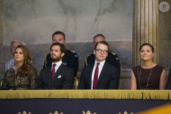 Madeleine de Suède enceinte et son frère, Carl Philip de Suède, la princesse héritière Victoria de Suède et son époux le prince Daniel lors de l'inauguration de l'exposition "40 ans sur le trône, 40 ans au service de la Suède" dans le cadre du jubilé des 40 ans de règne du roi Carl XVI Gustaf à Stockholm, le 13 septembre 2013