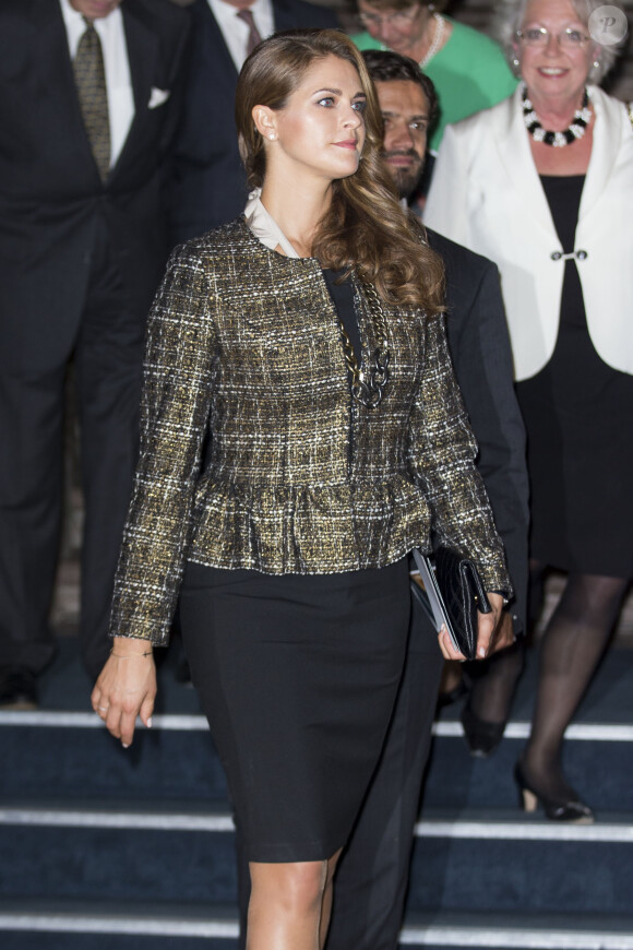 La princesse Madeleine de Suède enceinte lors de l'inauguration de l'exposition "40 ans sur le trône, 40 ans au service de la Suède" dans le cadre du jubilé des 40 ans de règne du roi Carl XVI Gustaf à Stockholm, le 13 septembre 2013