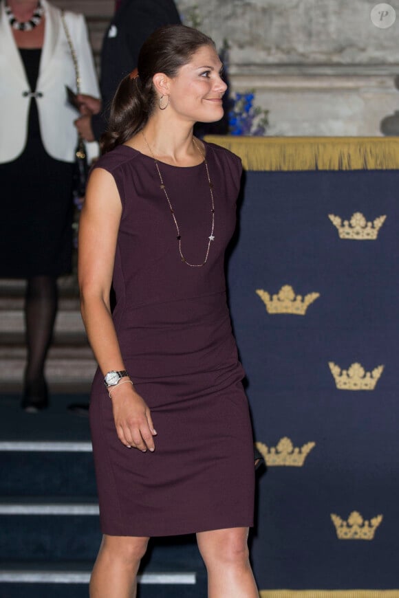 La princesse héritière Victoria de Suède lors de l'inauguration de l'exposition "40 ans sur le trône, 40 ans au service de la Suède" dans le cadre du jubilé des 40 ans de règne du roi Carl XVI Gustaf à Stockholm, le 13 septembre 2013