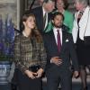 La princesse Madeleine de Suède, enceinte, et le prince Carl Philip de Suède lors de l'inauguration de l'exposition "40 ans sur le trône, 40 ans au service de la Suède" dans le cadre du jubilé des 40 ans de règne du roi Carl XVI Gustaf à Stockholm, le 13 septembre 2013