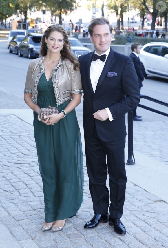La princesse Madeleine de Suède, enceinte, et son mari Chris O'Neill lors du dîner au musée nordique, dans le cadre du jubilé des 40 ans de règne du roi Carl XVI Gustaf à Stockholm le 14 septembre 2013