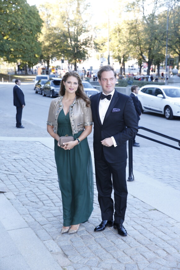 Madeleine de Suède, enceinte, et son mari Chris O'Neill lors du dîner au musée nordique, dans le cadre du jubilé des 40 ans de règne du roi Carl XVI Gustaf à Stockholm le 14 septembre 2013